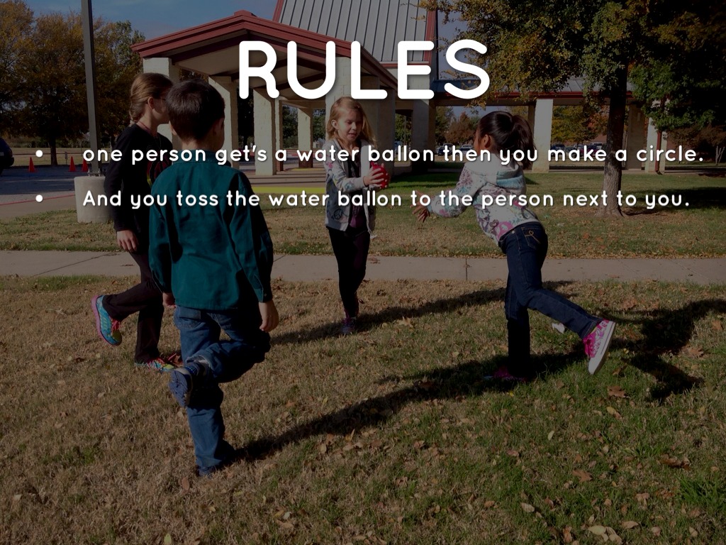 Tossing Water balloons by Stephanie Calkins